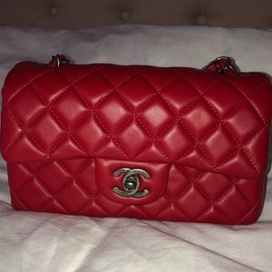 Authentic Chanel rectangular mini lambskin in Red